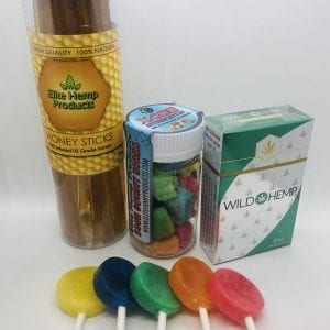 CBD bundle including CBD infused honey, lollipops, cigarettes, and gummies