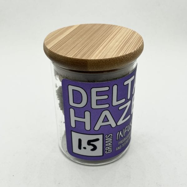 A 1.5 gram jar of Delta 8 THC flower, Haze strain.
