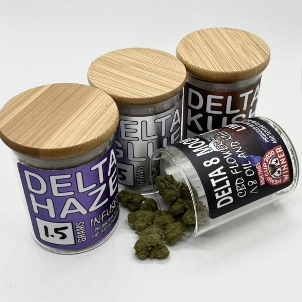 Three 1.5 gram jars of Delta 8 THC flower and one 1.5g jar of Delta 8 THC moon rocks.