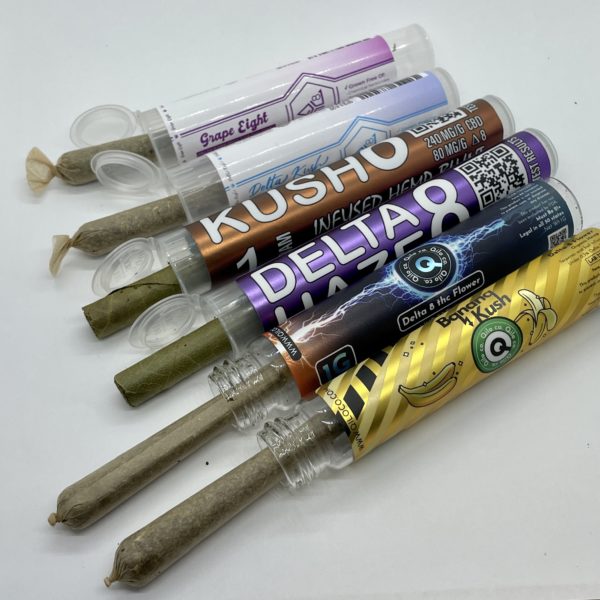 Delta 8 THC blunt & pre-roll sampler, with two THC 8 blunts and four pre-rolls.
